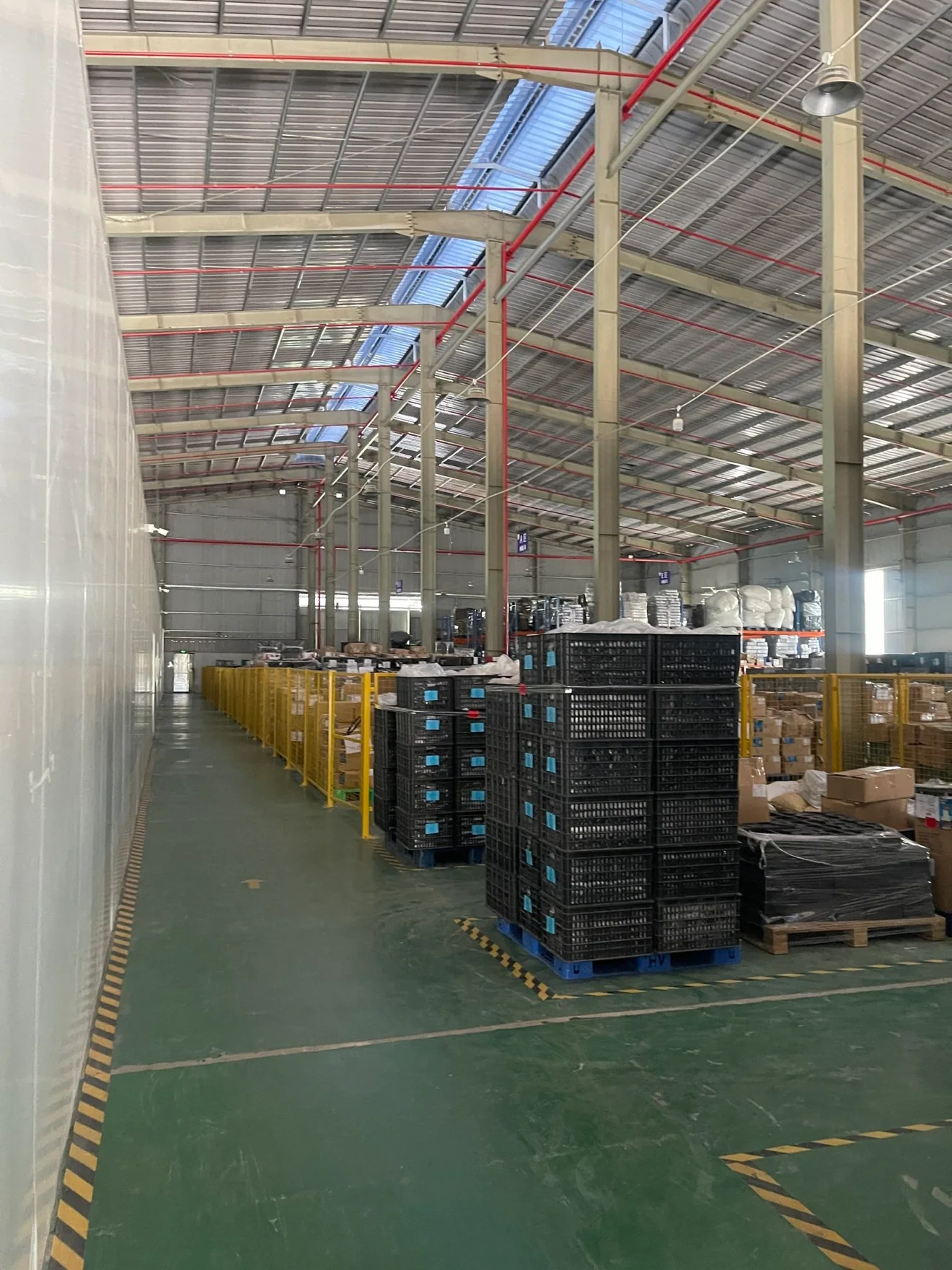 Material and component storage areas at the MEIGUAN facility in Vietnam.